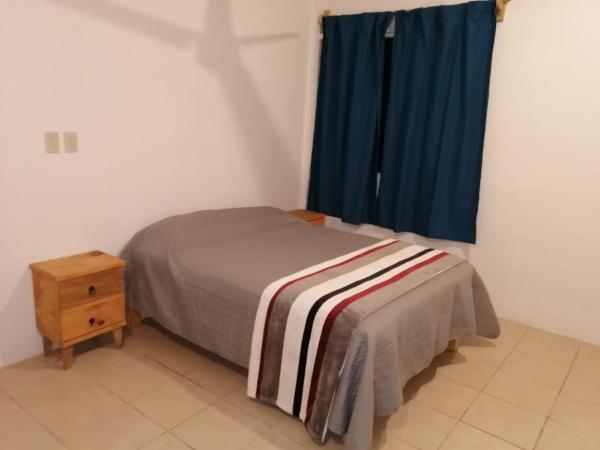 Cama o camas de una habitación en Apartamento-Estudio 10 min en playa Mismaloya