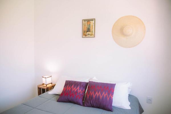 A bed or beds in a room at VillaRosa Aparts