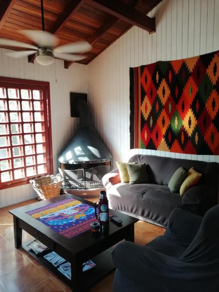 a living room with a couch and a table at La Manuela in Piriápolis