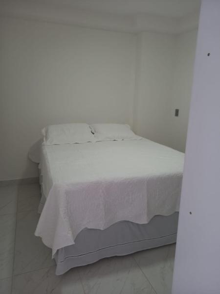 Cama o camas de una habitación en Branco Haus, vista deslumbrante no Caribessa
