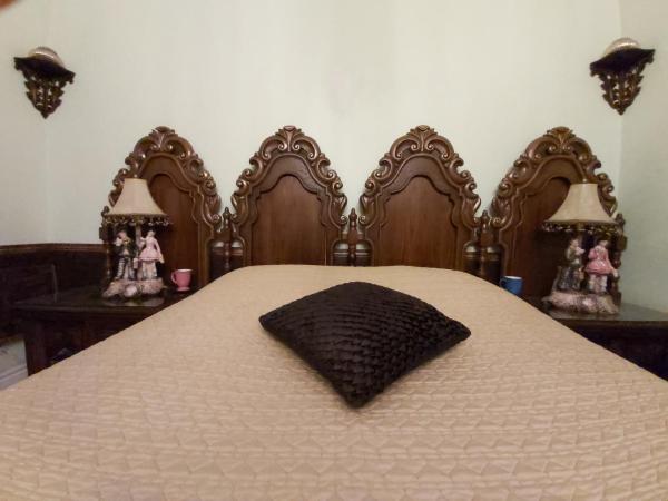 Cama o camas de una habitación en Lovely Classic Room