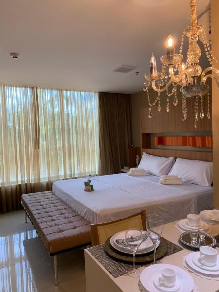 Cama o camas de una habitación en Aconchegante Apartamento em Brasília
