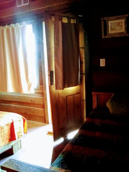 Cama o camas de una habitación en cabañas loft molino viejo