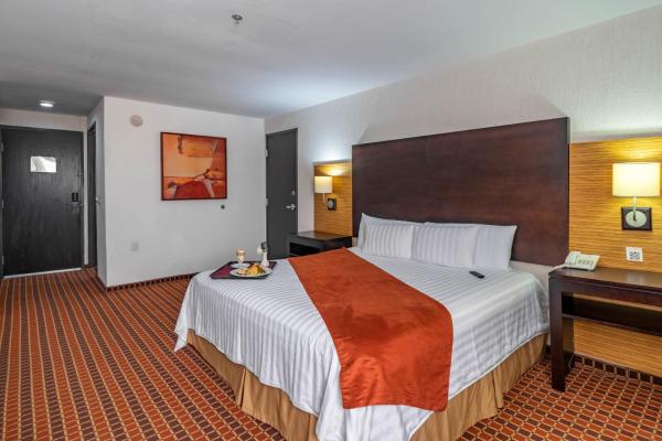 Cama o camas de una habitación en Paris FC Hotel