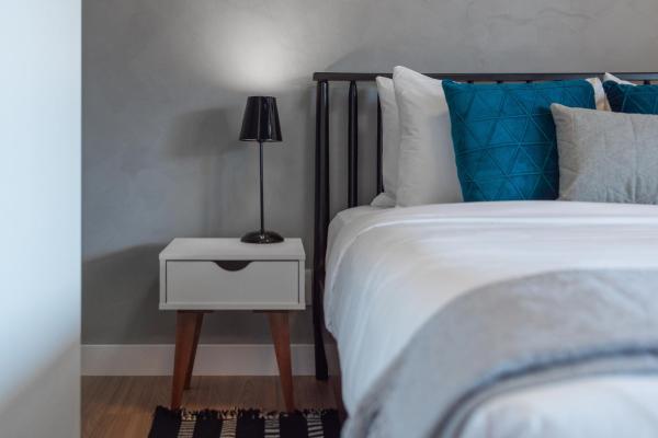 Cama o camas de una habitación en Apartamento moderno como huelga - Villa Olimpia