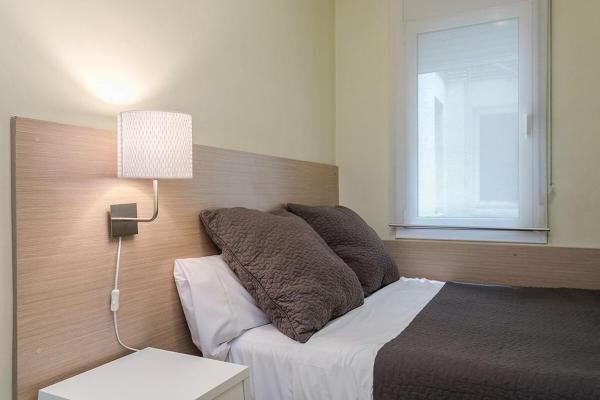 Cama o camas de una habitación en Elegante 3 Bedroom with views of Sagrada Familia