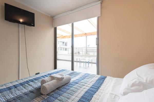 Cama o camas de una habitación en Urban Miró - 2BR, Parking, Wifi, TV, Metro