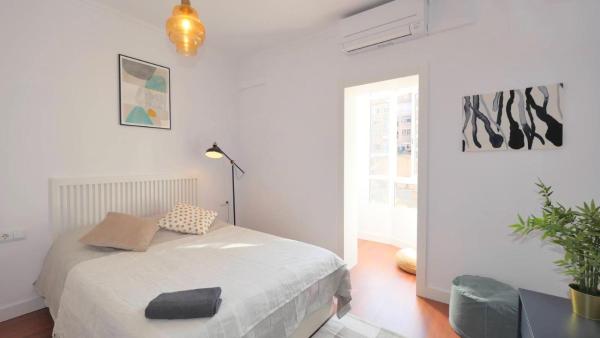 Cama o camas de una habitación en BEAUTIFUL & MODERN 2-BED IN EIXAMPLE