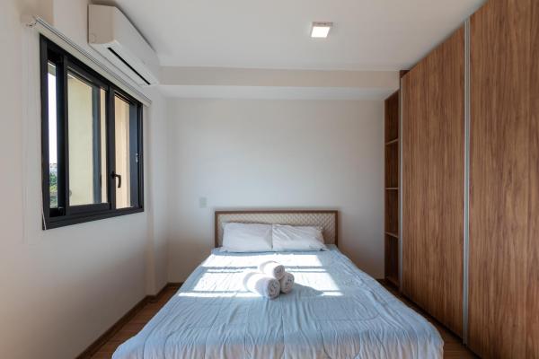 Cama o camas de una habitación en Vivapp Is Moema Residencial