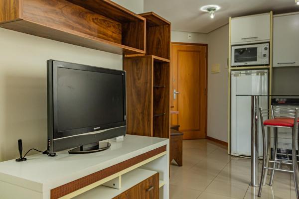 A television and/or entertainment centre at Apartamento para Casal, Florianopolis Centro, Bela Vista