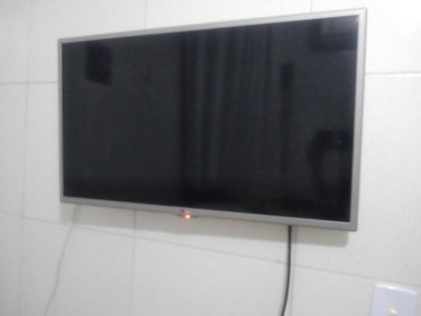 Una televisión o centro de entretenimiento en Hostel Hay's 1 Aeroporto Boa Viagem
