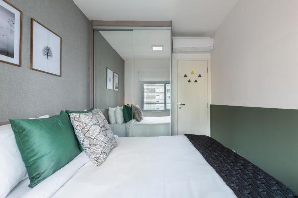 Cama o camas en una habitación en Sofisticado apartamento a tres manzanas de la Avenida Paulista