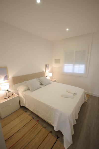 Cama o camas de una habitación en Livingtarifa Apartamento Coco