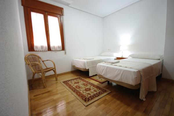 Cama o camas de una habitación en Livingtarifa Apartament El Atún