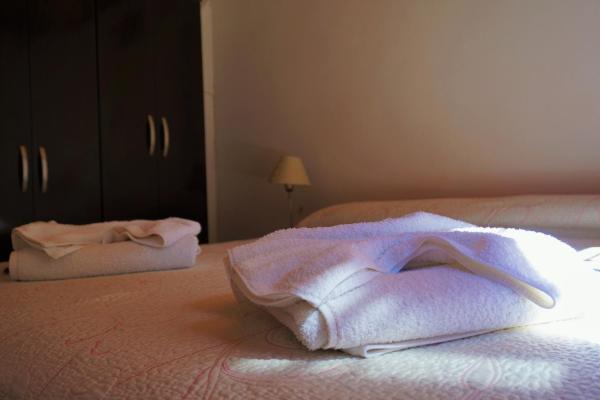 A bed or beds in a room at Cabañas el Pinar