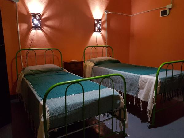 Cama o camas de una habitación en La Casa del Viejo Correo