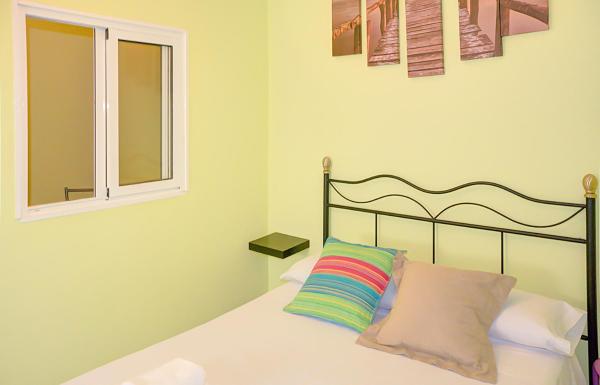 Cama o camas de una habitación en Apartamento en Triana con encanto