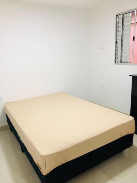 Cama o camas de una habitación en Apartamento no Tremembé 20