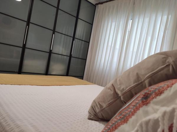 Cama o camas de una habitación en Apartamento en fuengirola cerca de la playa