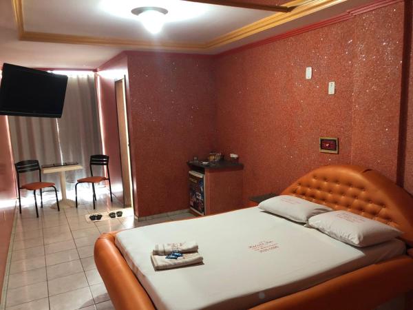 Cama o camas de una habitación en el Hotel l Motel 1001 Noites - Recanto das Emas