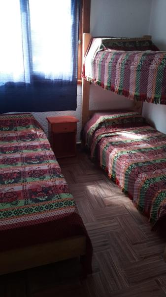 Una cama o camas en una habitación de Hotel Monte Castello