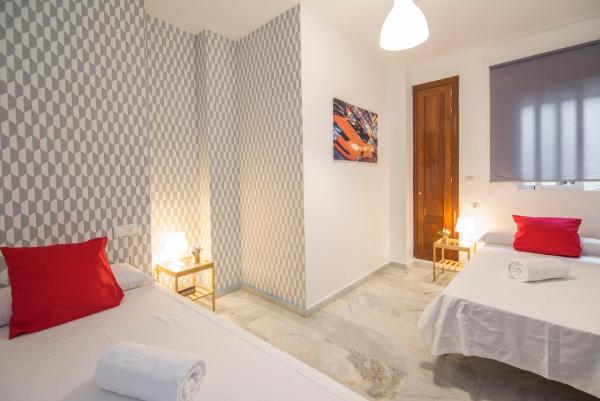 Cama o camas de una habitación en Apartamentos Granata