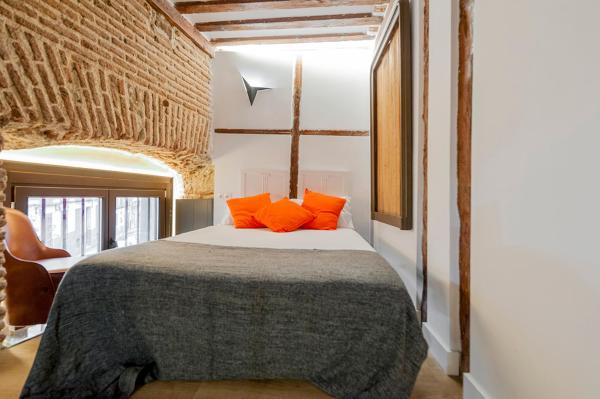 Cama o camas de una habitación en BNBHolder Design Loft Duplex LA LATINA