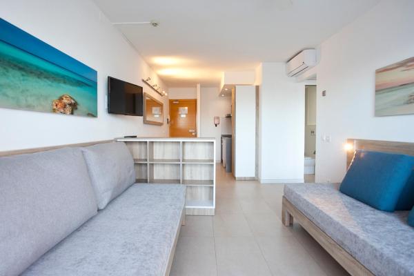 Zona de estar de Playa Bella Apartments