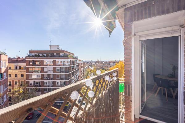 Un balcón o terraza de Delagua Apartments Atocha I