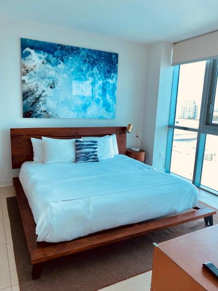 Cama o camas de una habitación en Monte Carlo by Miami Ambassadors