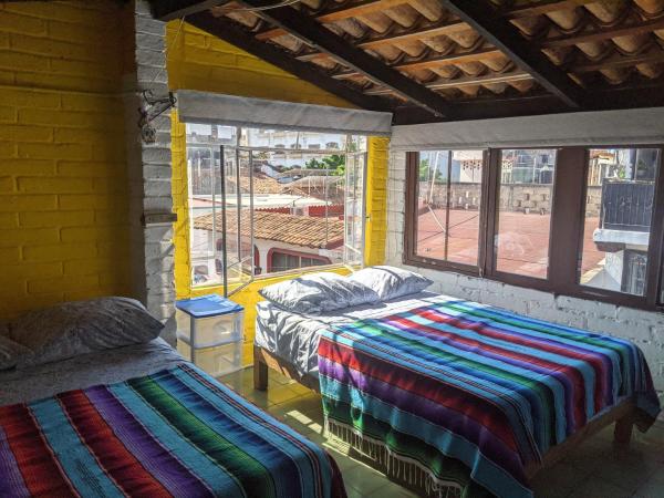 Cama o camas de una habitación en Casa Frida Vallarta