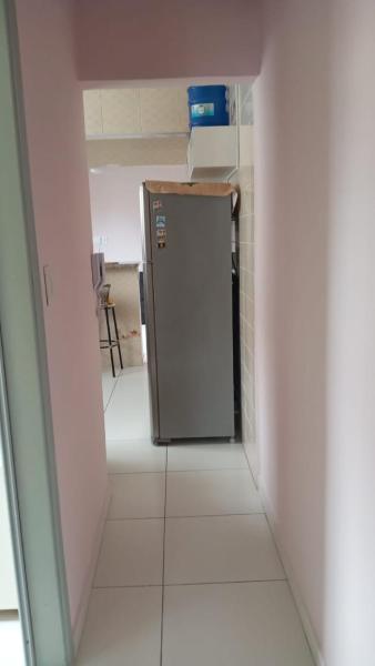 Una cocina o zona de cocina en Apartamento com Internet e garagem FREE ! PRAIA GRANDE