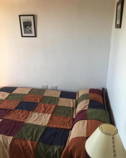 Cama o camas de una habitación en Paz y Armonia Habitaciones
