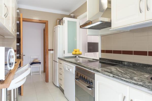 Una cocina o zona de cocina en Apartamento Tamarells Garden