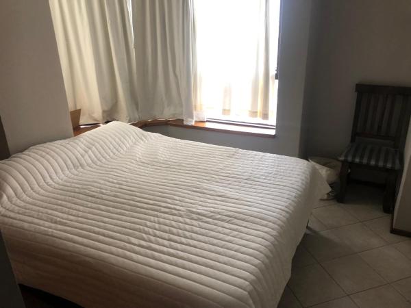 Una cama o camas en una habitación de Dpto 1d en Nva Cordoba excelente ubicación