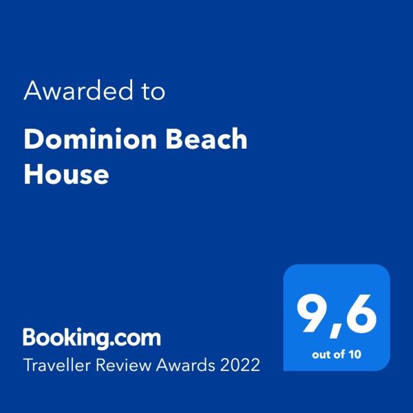 Certificado, premio, rótulo o documento que se muestra en Dominion Beach House