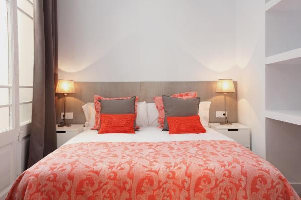 Cama o camas de una habitación en Click&Flat Seneca Suites