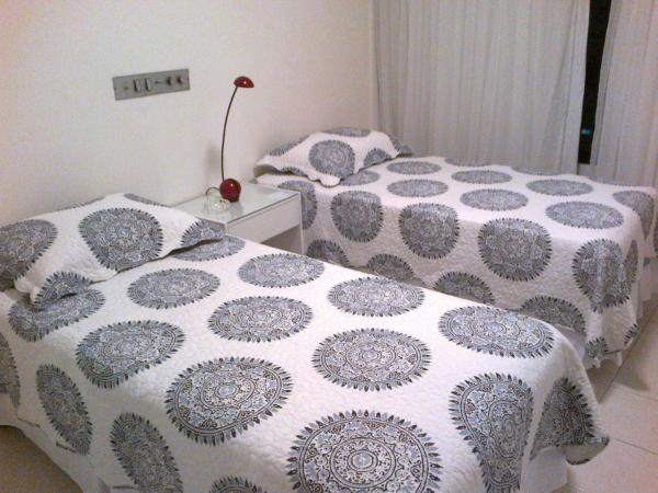 Cama o camas de una habitación en Apartamento em Ondina