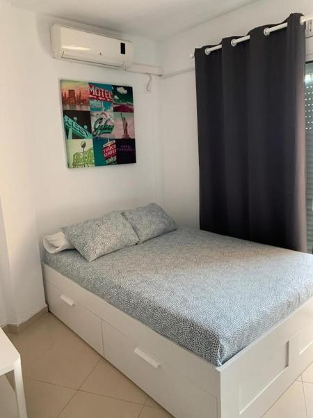 Cama o camas de una habitación en Apartment in Torremolinos close to beach