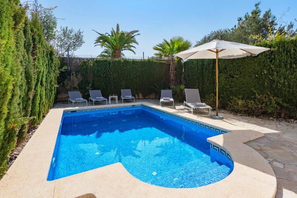 Piscina en o búsqueda de Encantadora casa adosada junto al mar II