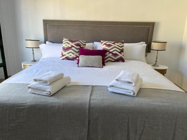 Cama o camas de una habitación en Apartamento Familiar Centro + PARKING