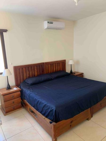 Cama o camas de una habitación en El Paraíso del Caribe