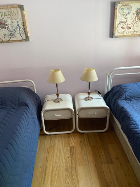 Cama o camas de una habitación en Frente al Lago y Veleros único