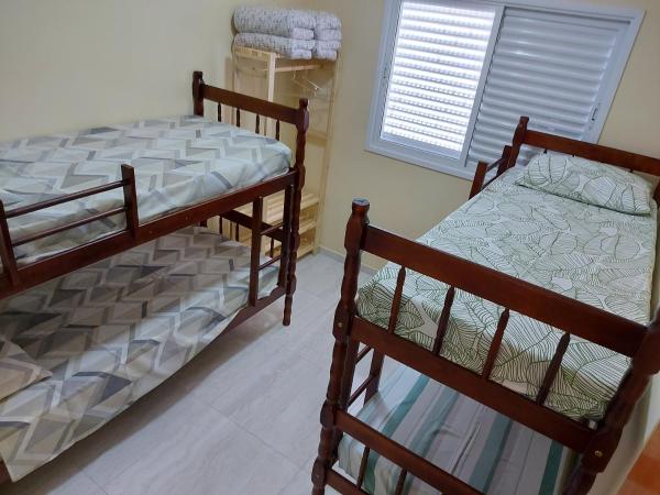 Cama o camas en una habitación en Apartamentos Vila Ré - Alójate frente al metro