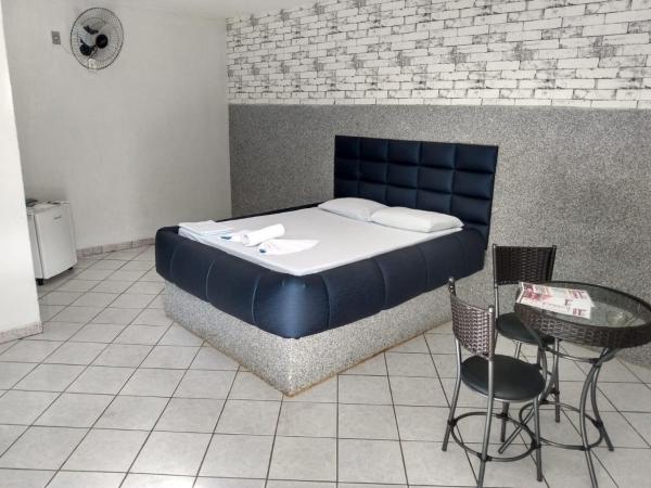 Cama o camas de una habitación en el Hotel l Motel 1001 Noites - Samambaia - BR 060
