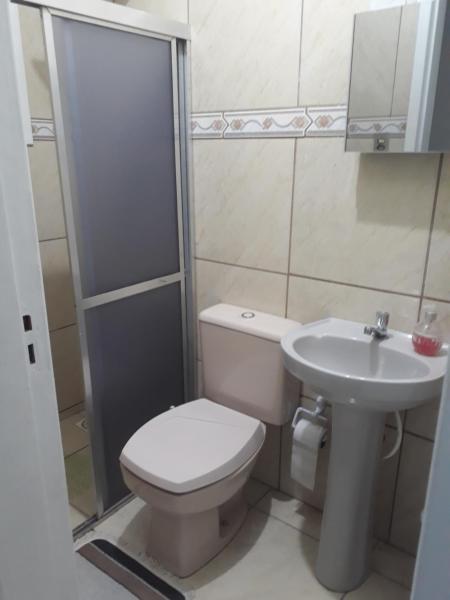 Un baño de APARTAMENTOS POR DIÁRIA Av DOMINGOS DE ALMEIDA