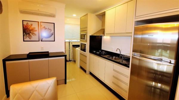 Una cocina o zona de cocina en 1044 - Apartamento de 01 dormitório em Bombinhas - Residencial Egídio Pinheiro 101 B