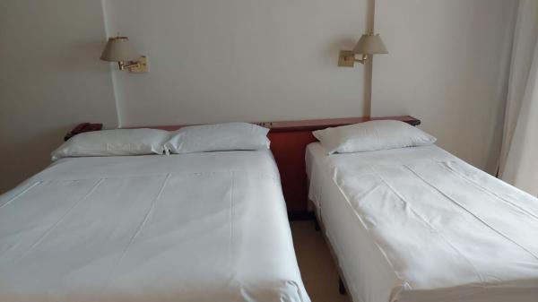 Cama o camas de una habitación en Flat Particular Hotel Kubitschek