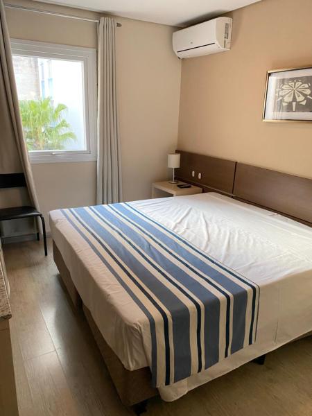 Cama o camas de una habitación en Hotel Sol By MRHotelaria