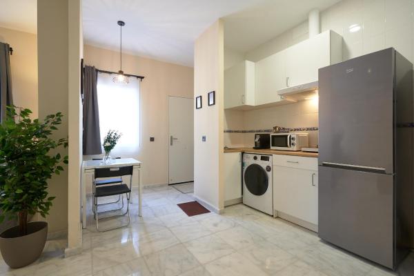 Una cocina o zona de cocina en Apartamentos Tejares de Triana 16B